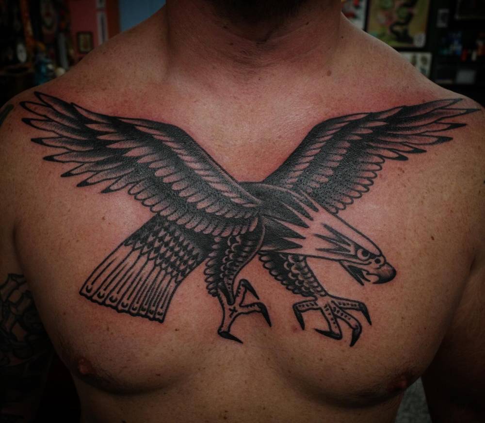 Traditional style eagle chest piece tattoo.