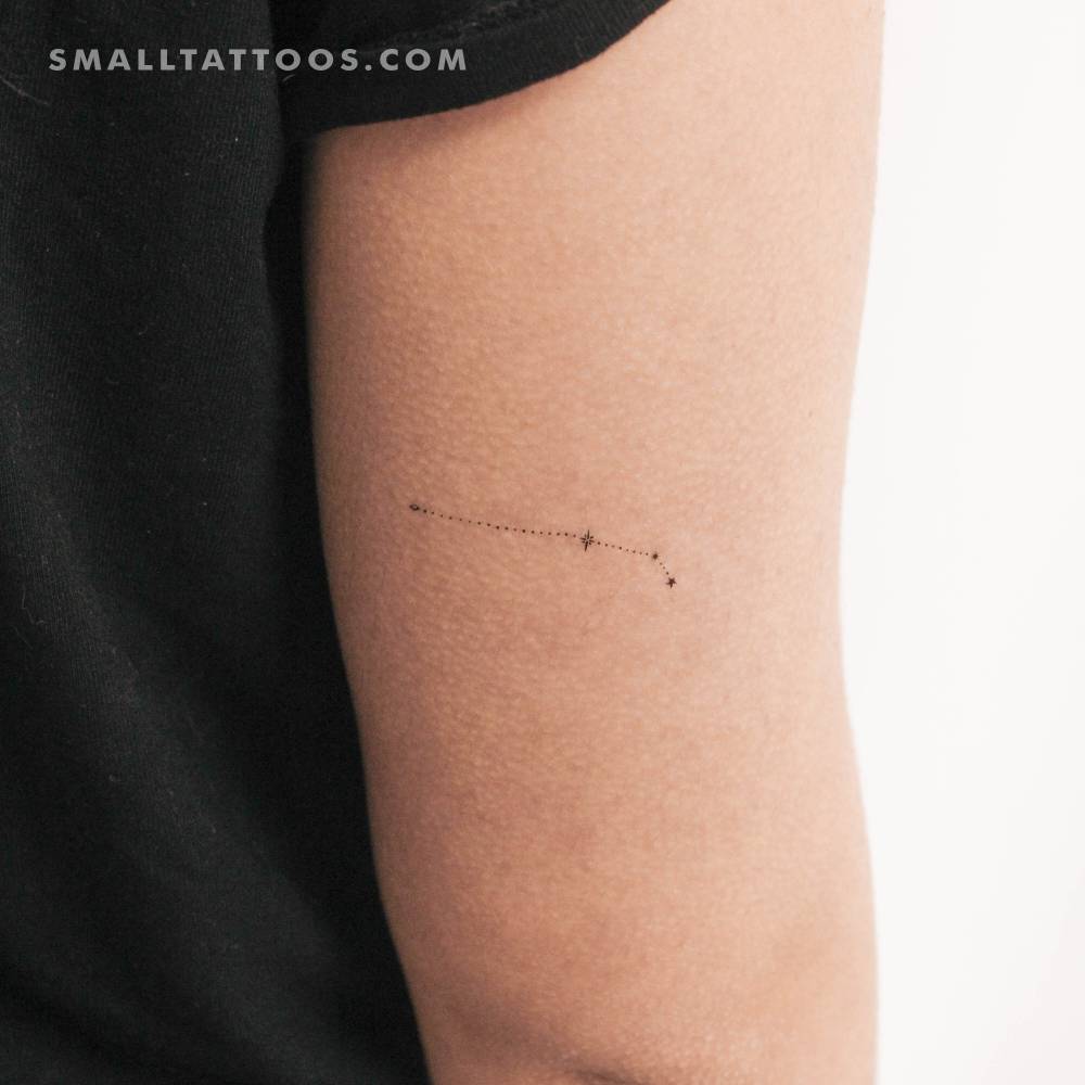 Dots Aries constellation temporary tattoo located on the tricep.