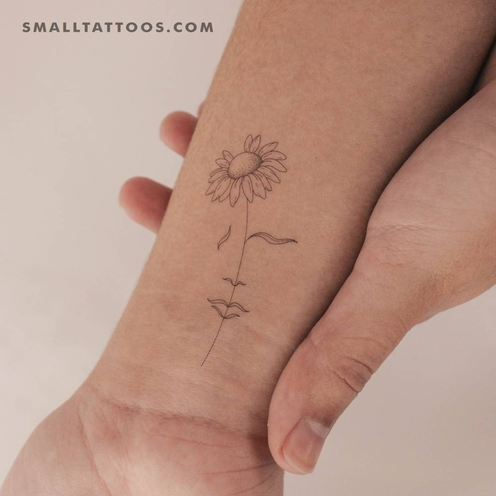 A Dreaming Daisy by Jakenowicz temporary tattoo.