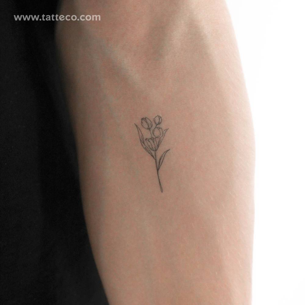 Tulip bouquet temporary tattoo located on the inner forearm.