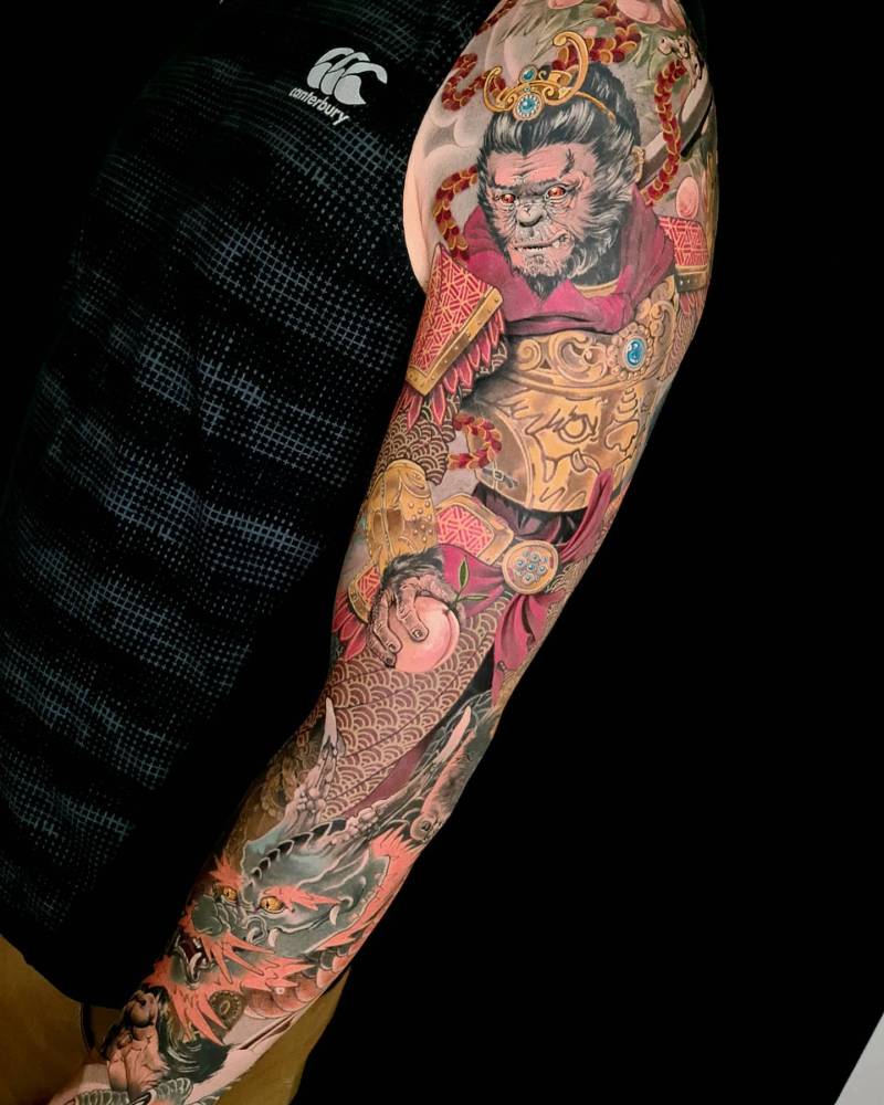 Monkey King sleeve tattoo in oriental style.