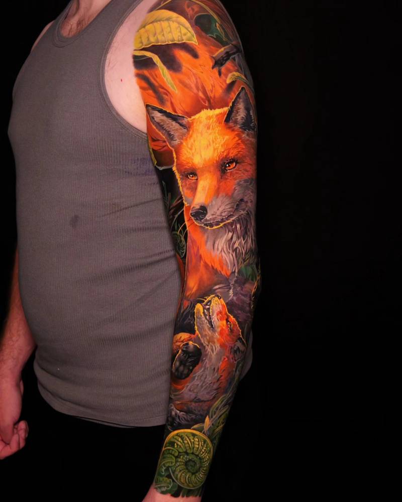 Foxes tattoo sleeve in realistic style.