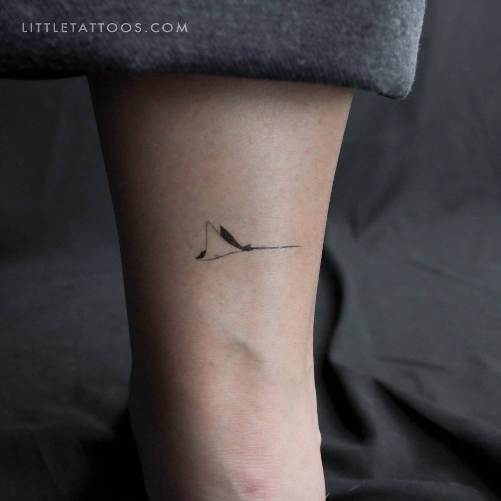 Spotted eagle ray temporary tattoo located on the achilles.