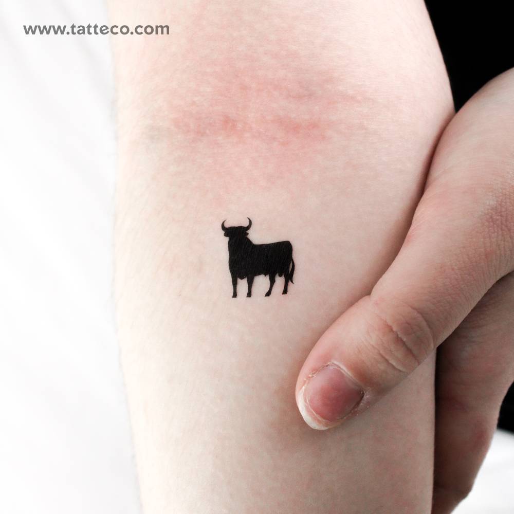 Spanish bull temporary tattoo located on the inner forearm.