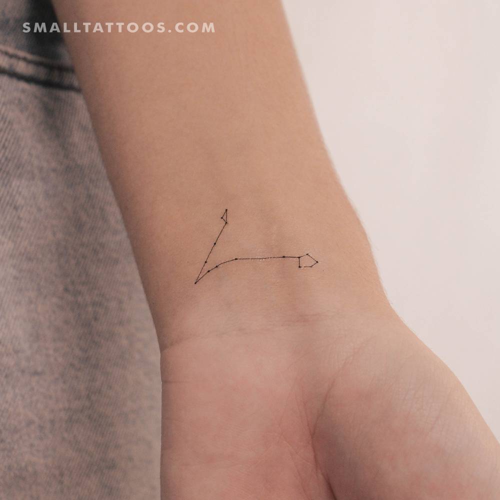 Small minimalist Pisces constellation temporary tattoo.