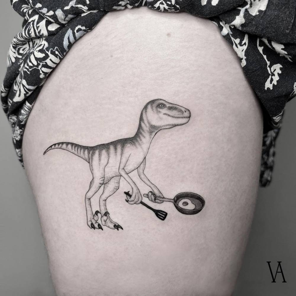 Velociraptor chef tattooed on the thigh, illustrative style.