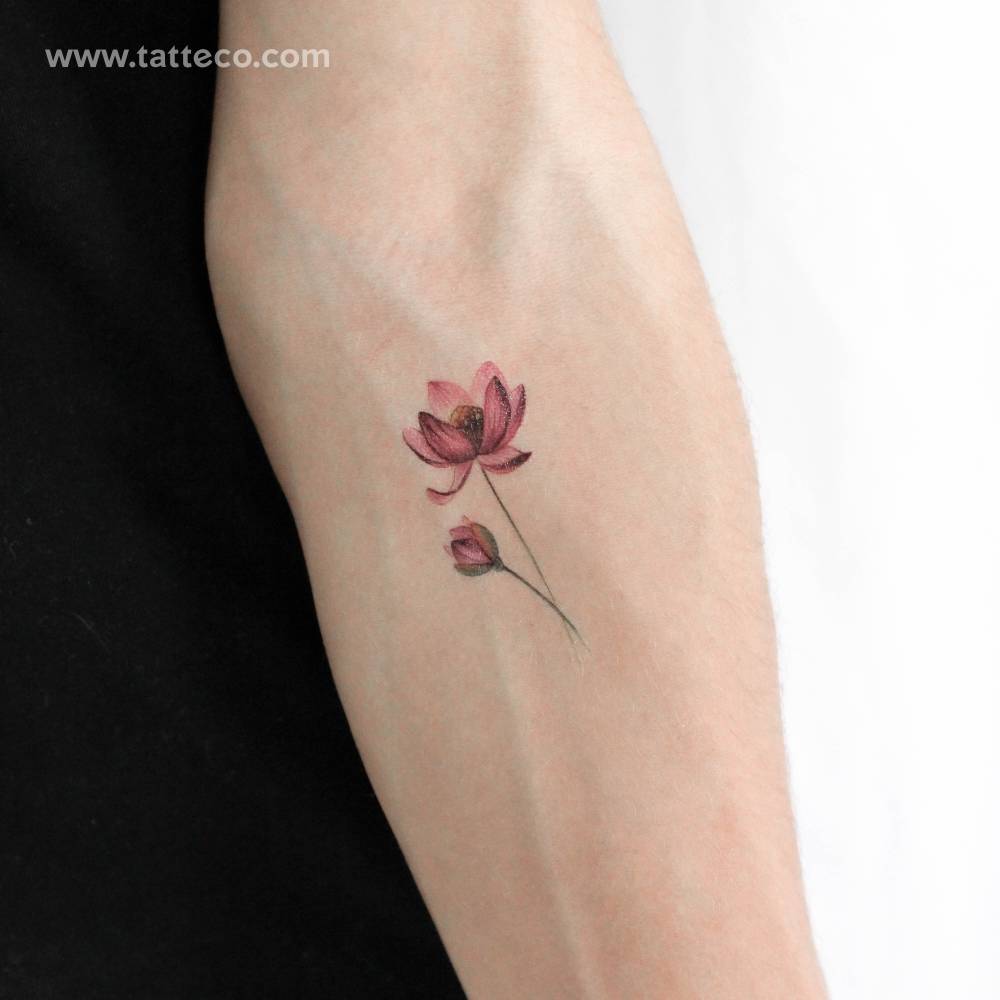Watercolor style lotus temporary tattoo located on the inner forearm.