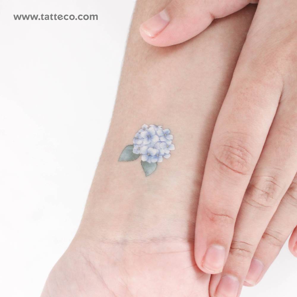 Blue hydrangea temporary tattoo located on the wrist.