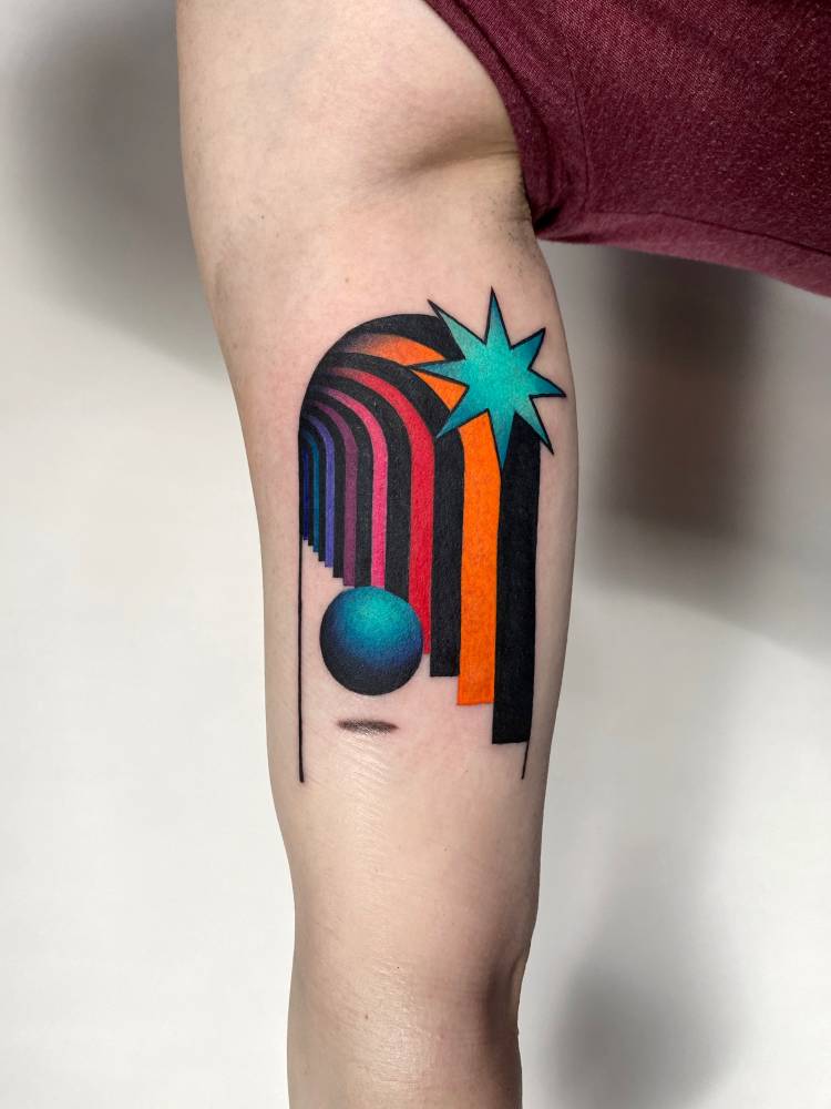 Surrealistic style hallway tattoo located on the upper arm.