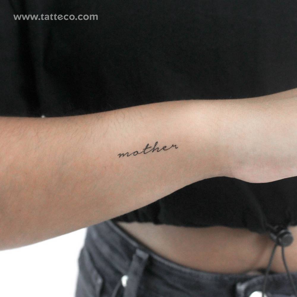 Handwritten font word "mother" temporary tattoo located on the wrist.