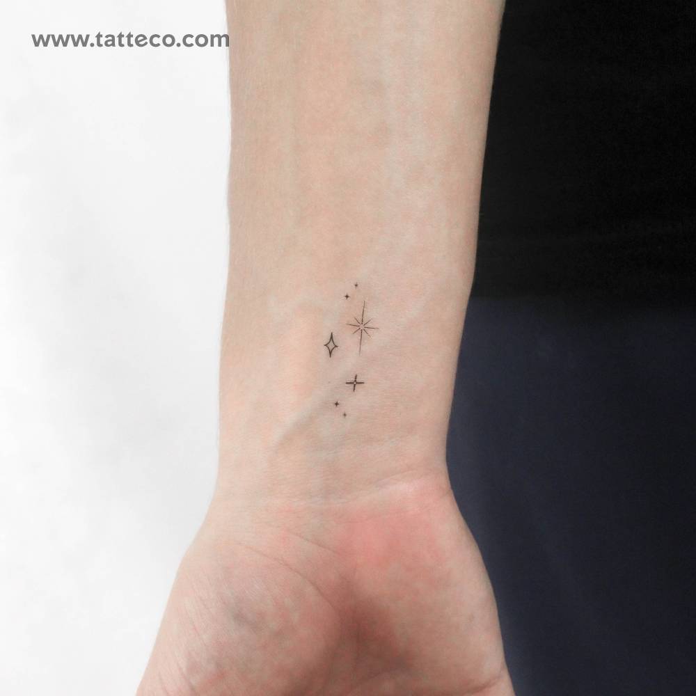 Stars sparkles temporary tattoo located on the wrist.