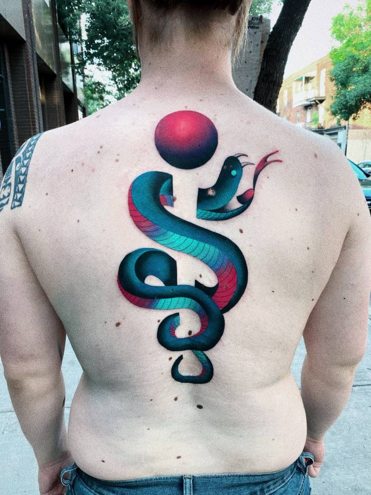Snake tattoo in pop art style located on the back.