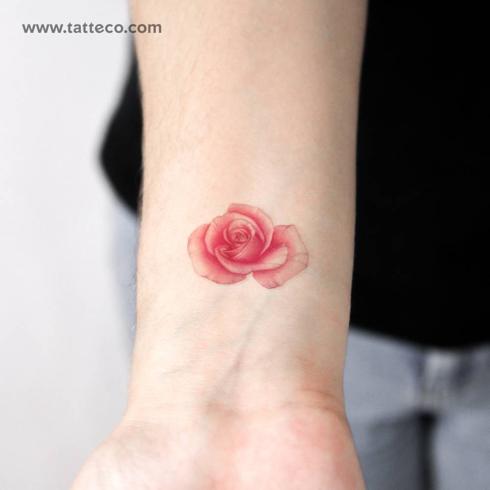 lllustrative style pink rose head temporary tattoo.