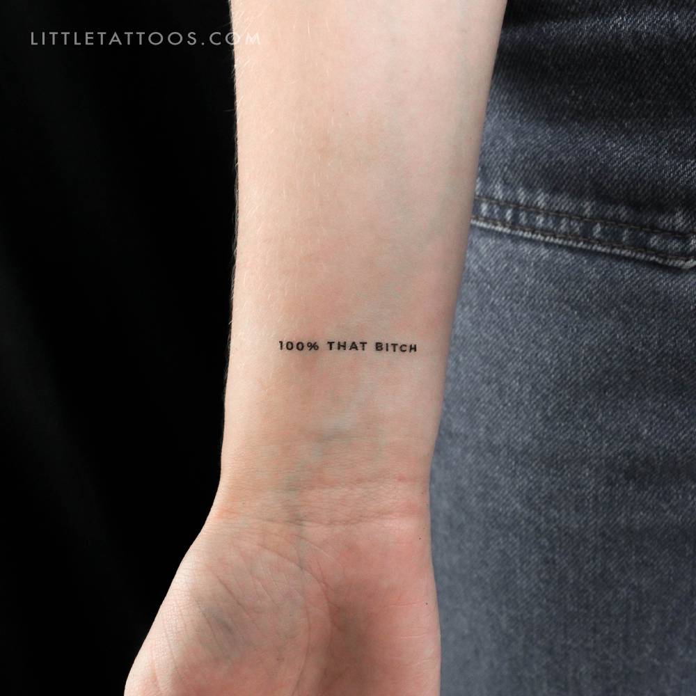 "100% THAT BITCH" temporary lettering tattoo.
