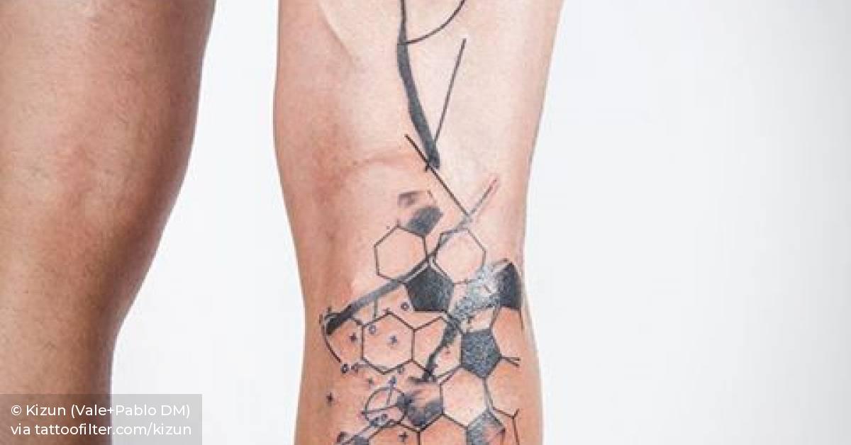 Graphic/abstract style composition tattoo that includes